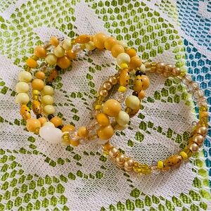 2pcs Yellow and Gold Beaded Bracelets